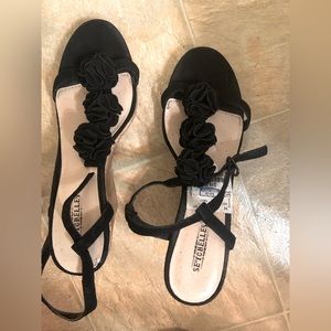 Black sandals, and a size 6 1/2 newly